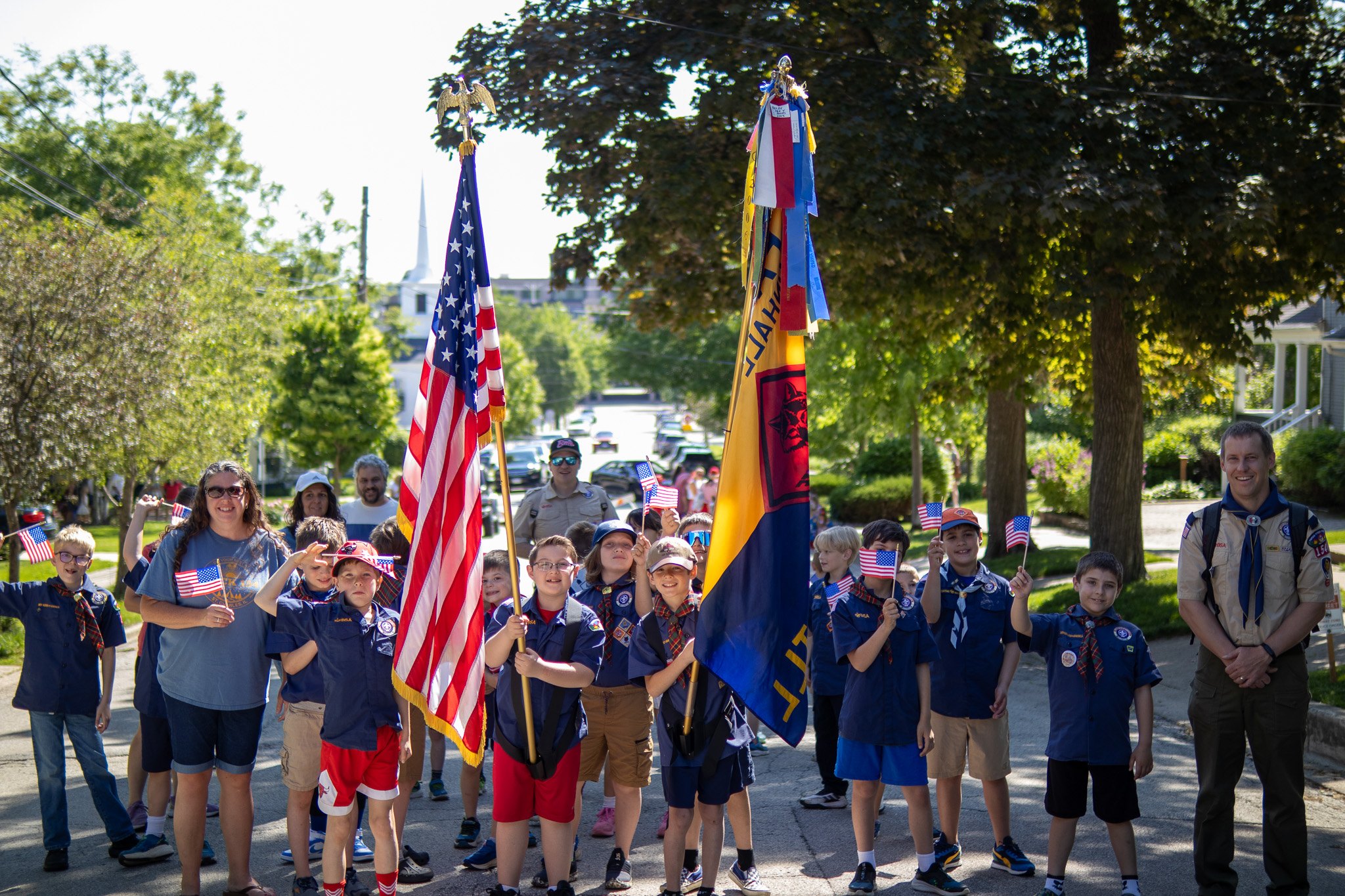 Pack 154 Scouts and leaders gathered with their flags in St. Charles